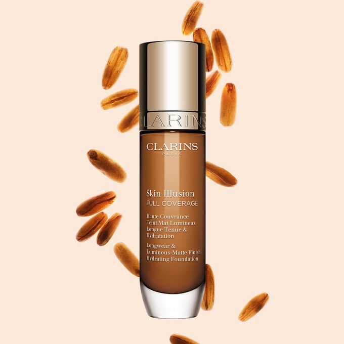 Clarins Skin Illusion Full Coverage showcasing its sleek design and vibrant packaging, the ideal foundation for a flawless & natural complexion.