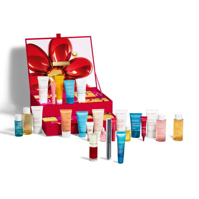 Clarins 24 day beauty advent calendar filled with skincare bodycare and makeup full size and travel minis in red box.