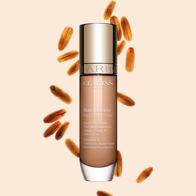 Clarins Skin Illusion Full Coverage showcasing its sleek design and vibrant packaging, the ideal foundation for a flawless & natural complexion.