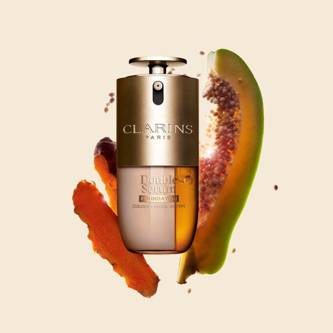 Packshot of Clarins Double Serum Foundation available for every skin tone, featuring key ingredients turmeric and papain