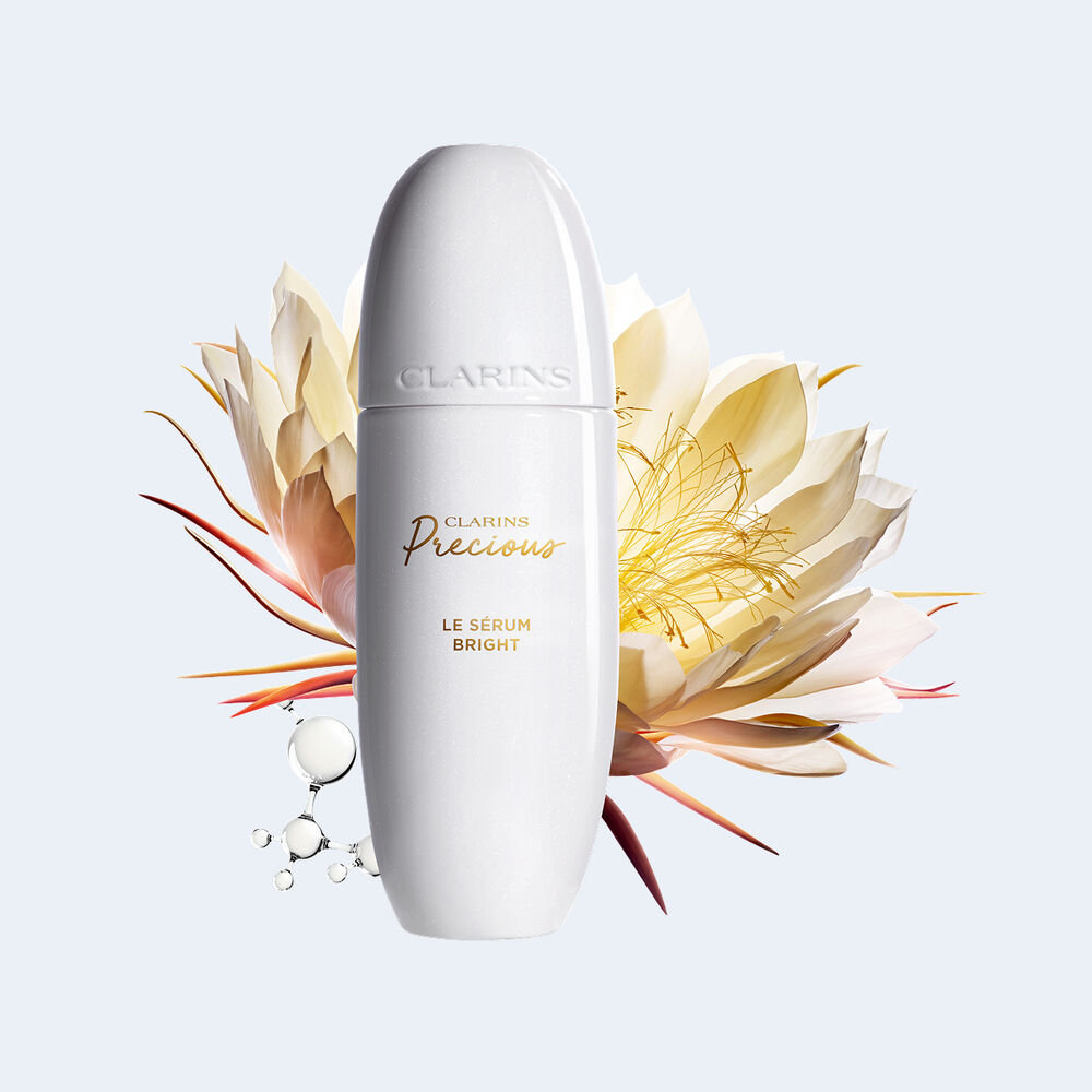 Packshot of Clarins Precious Bright Serum, surrounded by Moonlight Flower and Peptide Molecules, illustrating key ingredients for anti-aging.