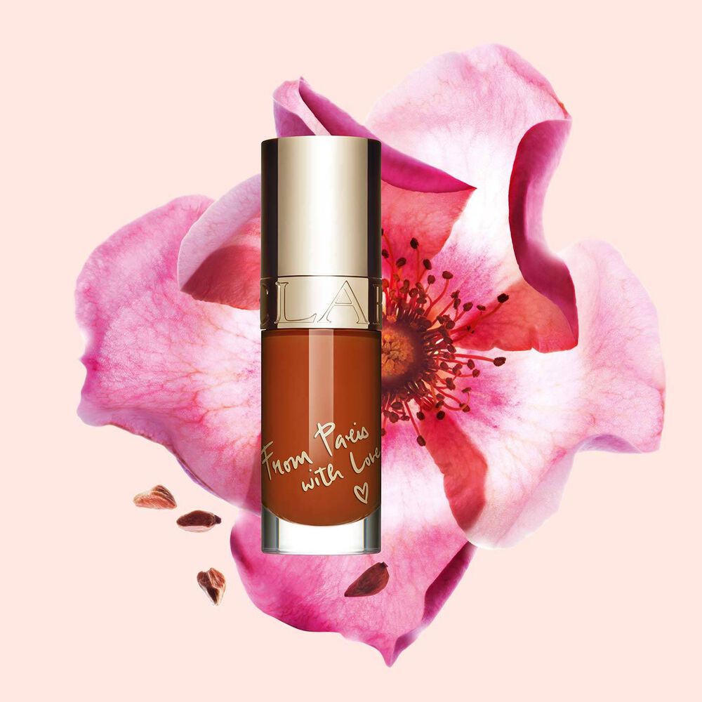 Clarins Lip Comfort Oil - Limited Edition in Brick shade, offering hydration, plumping, and all-day nourishment.