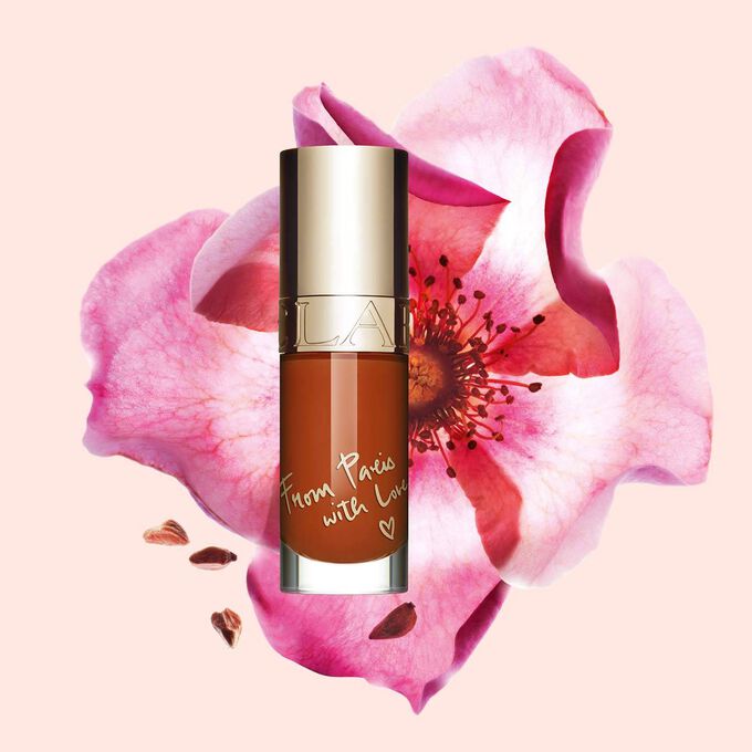 Clarins Lip Comfort Oil - Limited Edition in Brick shade, offering hydration, plumping, and all-day nourishment.