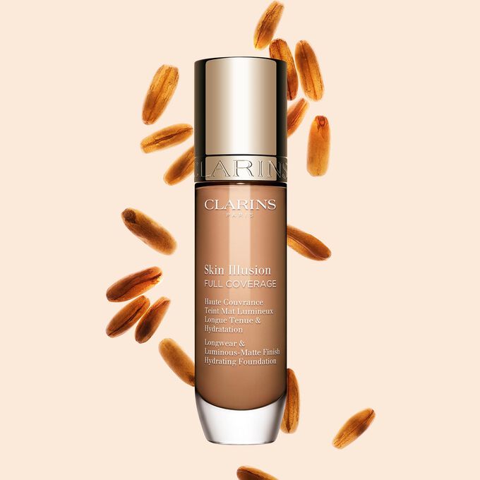 Clarins Skin Illusion Full Coverage showcasing its sleek design and vibrant packaging, the ideal foundation for a flawless & natural complexion.