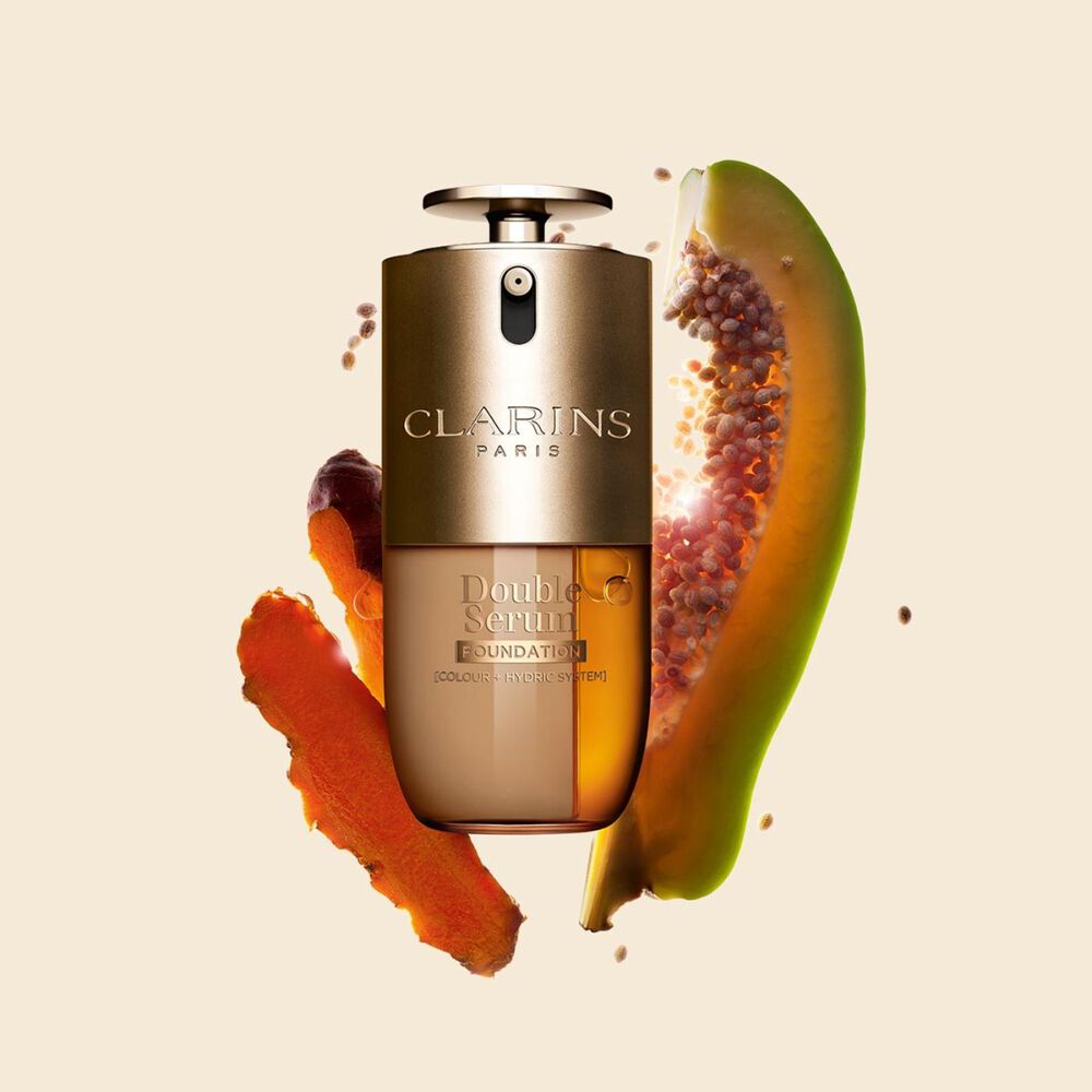 Packshot of Clarins Double Serum Foundation available for every skin tone, featuring key ingredients turmeric and papain
