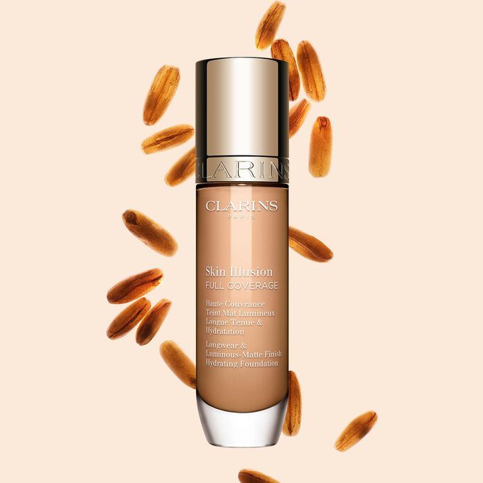 Clarins Skin Illusion Full Coverage showcasing its sleek design and vibrant packaging, the ideal foundation for a flawless & natural complexion.