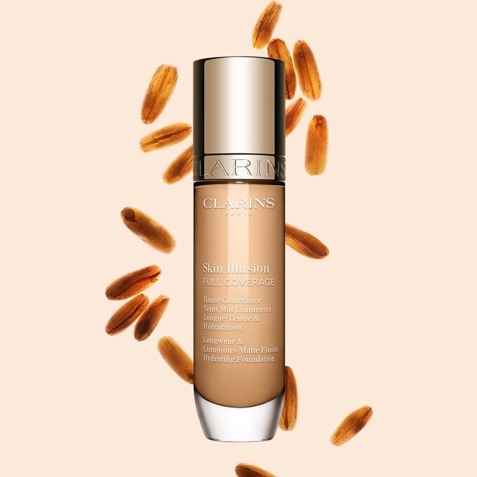 Clarins Skin Illusion Full Coverage showcasing its sleek design and vibrant packaging, the ideal foundation for a flawless & natural complexion.