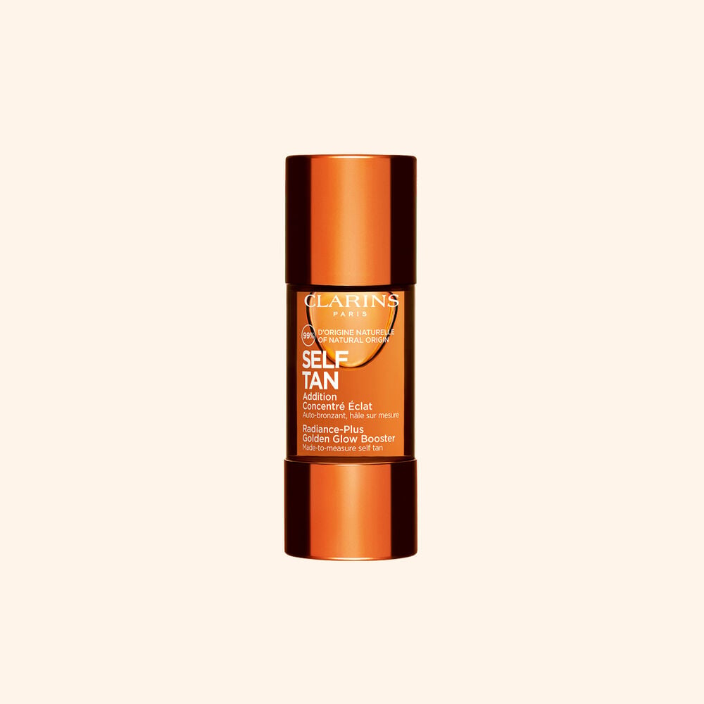 Packshot of Radiance-Plus Golden Glow Booster for Face by Clarins a concentrate to mix with face cream near aloe vera.