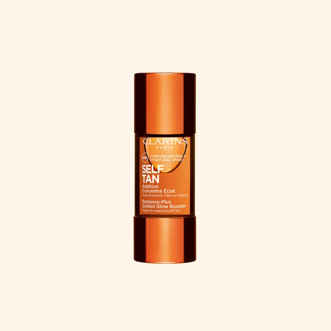 Packshot of Radiance-Plus Golden Glow Booster for Face by Clarins a concentrate to mix with face cream near aloe vera.