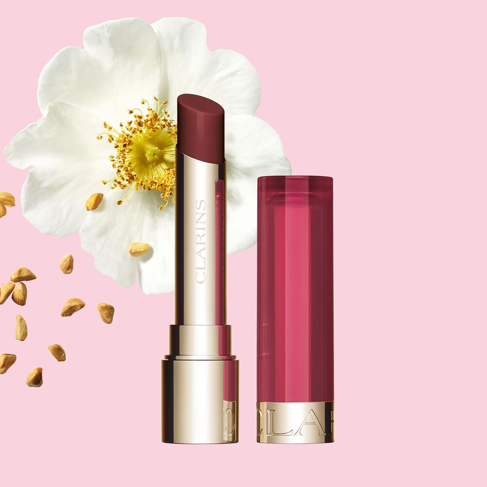 Clarins Nourishing Lip Oil Balm giving a subtle bordeau finish look
