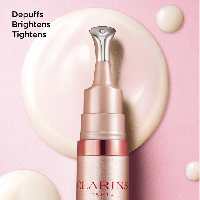 Clarins V Shaping Facial Lift Eye cream, with text highlighting its depuffing, brightening, and lifting fects on eye contour.
