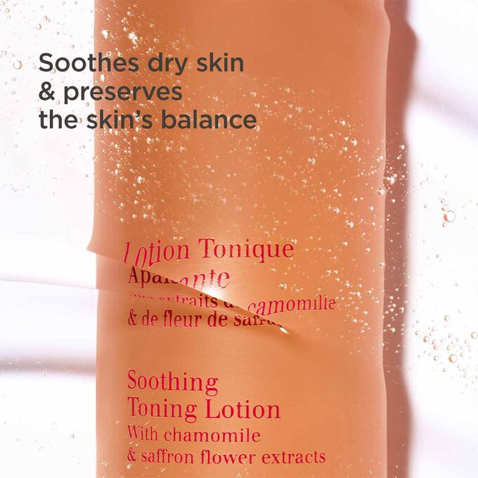 Packshot of the orange bottle of the soothing toning facial lotion half under water with text about its soothing and hydrating actions