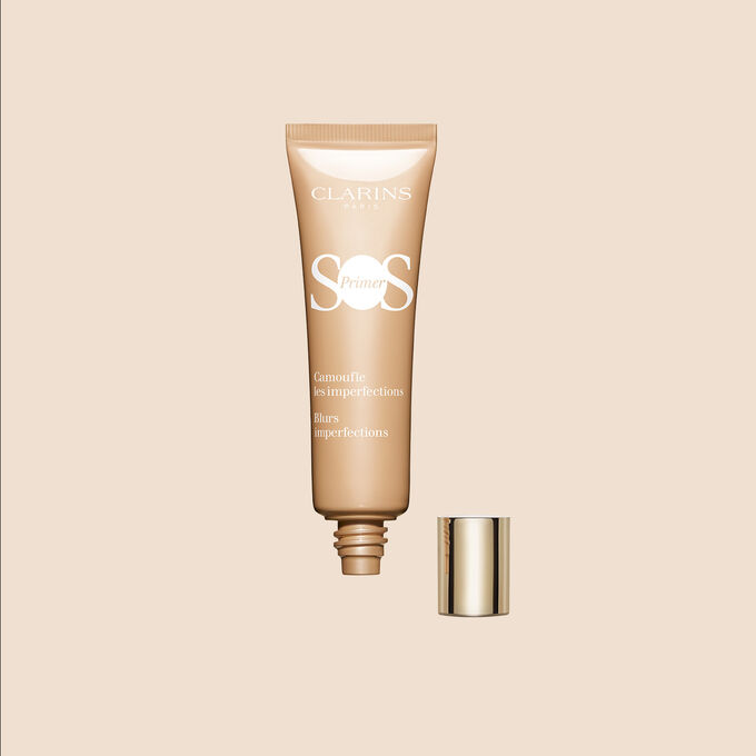 Packshot of SOS Primer Peach by Clarins with text emphasising its packaging is made of 40% recycled plastic.
