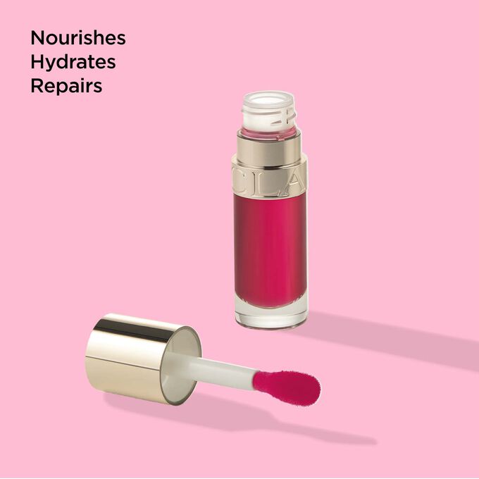 Packshot of Clarins Lip Comfort Oil 04 Pitaya with text emphasising the nourishing, hydrating, and repairing benits.