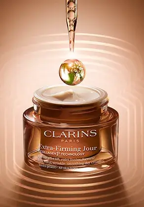 Extra-Firming day cream packshot with a pipette and a drop