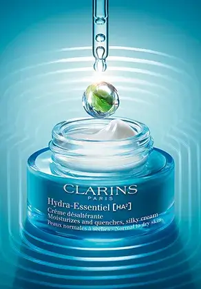 Hydra-Essentiel [HA2] day cream packshot with a pipette and a drop